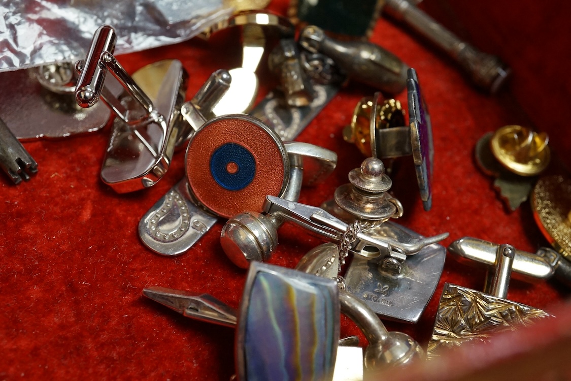 A small group of assorted jewellery and other items including a Victorian white metal albert, hung with a silver vesta case, a pair of gilt metal lorgnettes, cufflinks, scarab brooch and a white metal propelling pencil,